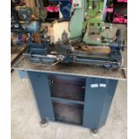 Lathe with cabinet below & box of assorted accesso