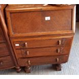 20th Century stained oak bureau with carved decora