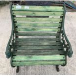 Green painted garden chair with green painted meta