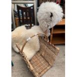 WIcker log basket & cream rug