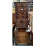 Miniature mahogany chest on chest together with a
