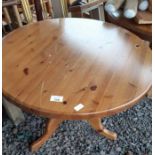 Round pine kitchen table & a pine occasional table