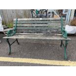 Garden bench with green painted metal bench ends