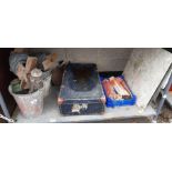 Shelf of tools, oil lamps, welding rods etc