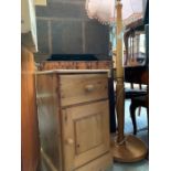 Small pine bedside cabinet together with a light o