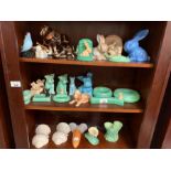 3 shelves of Sylvac ornaments, Beswick items etc