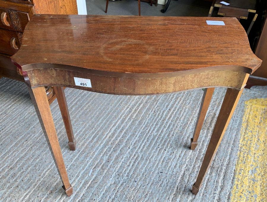 Mahogany veneered hall table with serpentine front