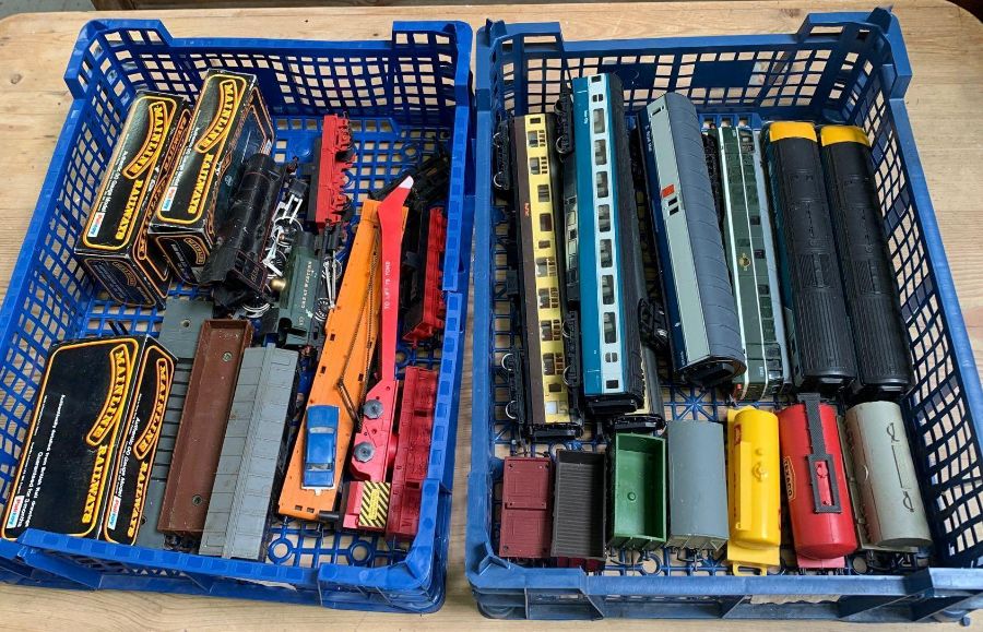 2 trays of toy train items some Hornby