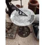 Metal sundial on metal base