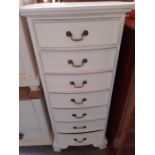 White painted tallboy with 7 short drawers and swi