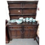 An Ercol style dark wood dresser