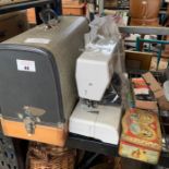 Frister Rossman cased sewing machine together with