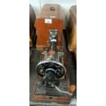 Cased singer sewing machine