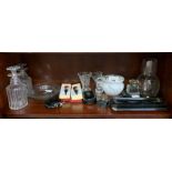 Shelf of glass vases, decanters, bottle stoppers e