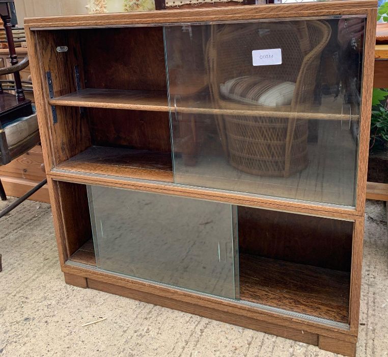 Mid 20th Century stained oak bookcase with glazed