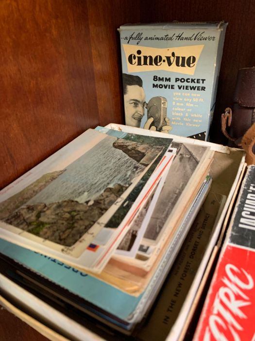 Shelf of collectables to include camera's, ear