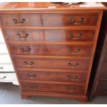 Modern yew wood chest of 6 graduated drawers on br