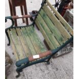 Green painted garden armchair with green painted e