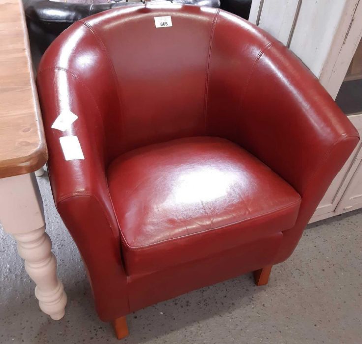 Pair of dark brown leatherette tub chairs together