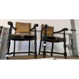 Pair of stained armchairs with tan leatherette uph