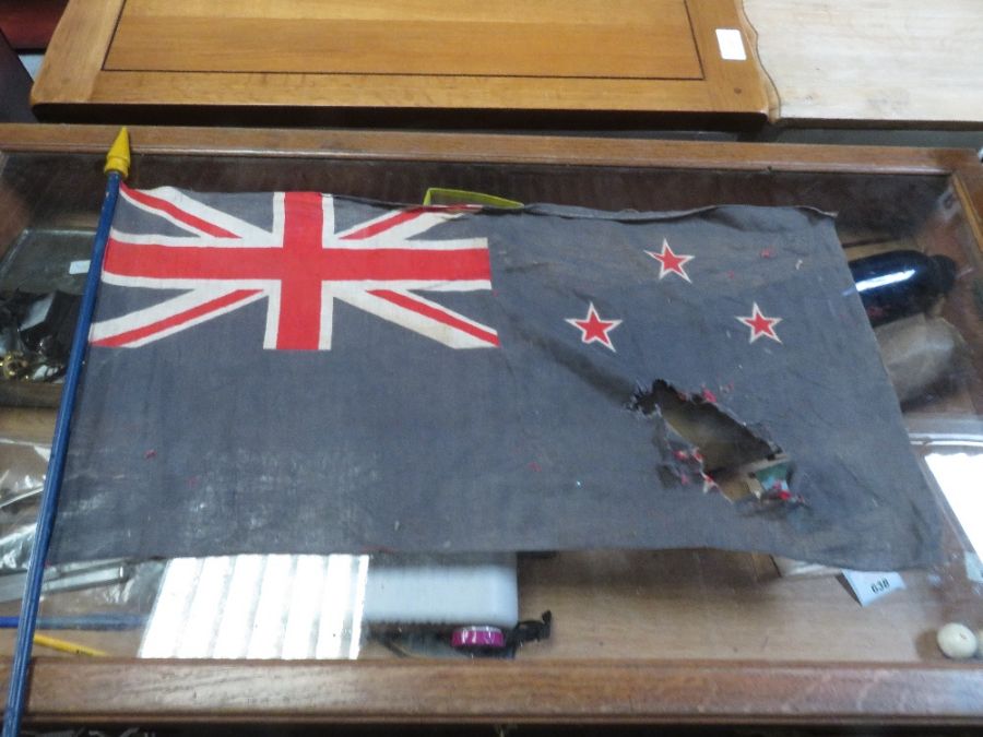 Shelf of china, old tins, flags & album of cigaret - Image 11 of 11