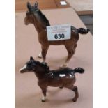 Beswick figure of a standing foal with another Bes