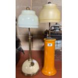 A Tilley style table lamp with Bretby glazed potte