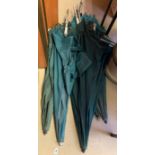 Six green fishing umbrellas with ground spike ends