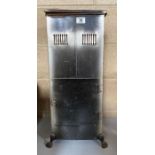 An early 20th Century oil heater in tall rectangul