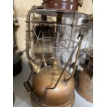 Six assorted lamps including Hurricane and Veritas