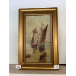 Oil on canvas of 2 sailing boats at sea in a gilt