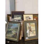 Shelf of framed pictures