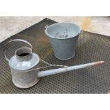 Galvanised bucket and a watering can