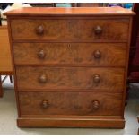 A 20th century mahogany chest of four long drawers