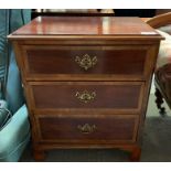 A 19th/20th century mahogany veneer chest of three