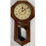 A mahogany cased (ansonia) wall clock with pendulu