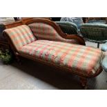 A Victorian mahogany framed chaise lounge, with ca