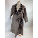 An early 20th century ladies coat, in a light grey