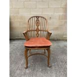 A 20th century oak and elm Windsor style armchair,