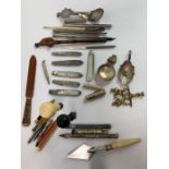 A collection of writing instruments, including dip
