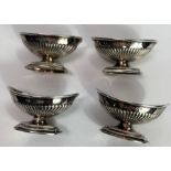 A matched set of four late Victorian silver salts,
