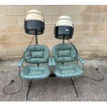 A pair of vintage hairdressers chairs, upholstered