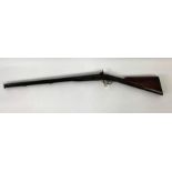 An antique 16 bore percussion double barrelled black