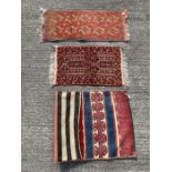 A small rectangular prayer rug with repeating geom