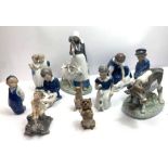 A collection of Royal Copenhagen figures - a milkm