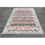 A 20th century Indian Dhurry rug,