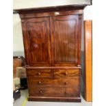 A Victorian mahogany linen press, with moulded cor