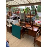 Cupboard on casters along with 2 blue seated dining