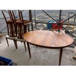 Oval extending dining table with 4 chairs, label o