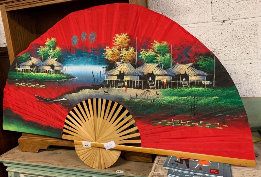 Large decorative red fan